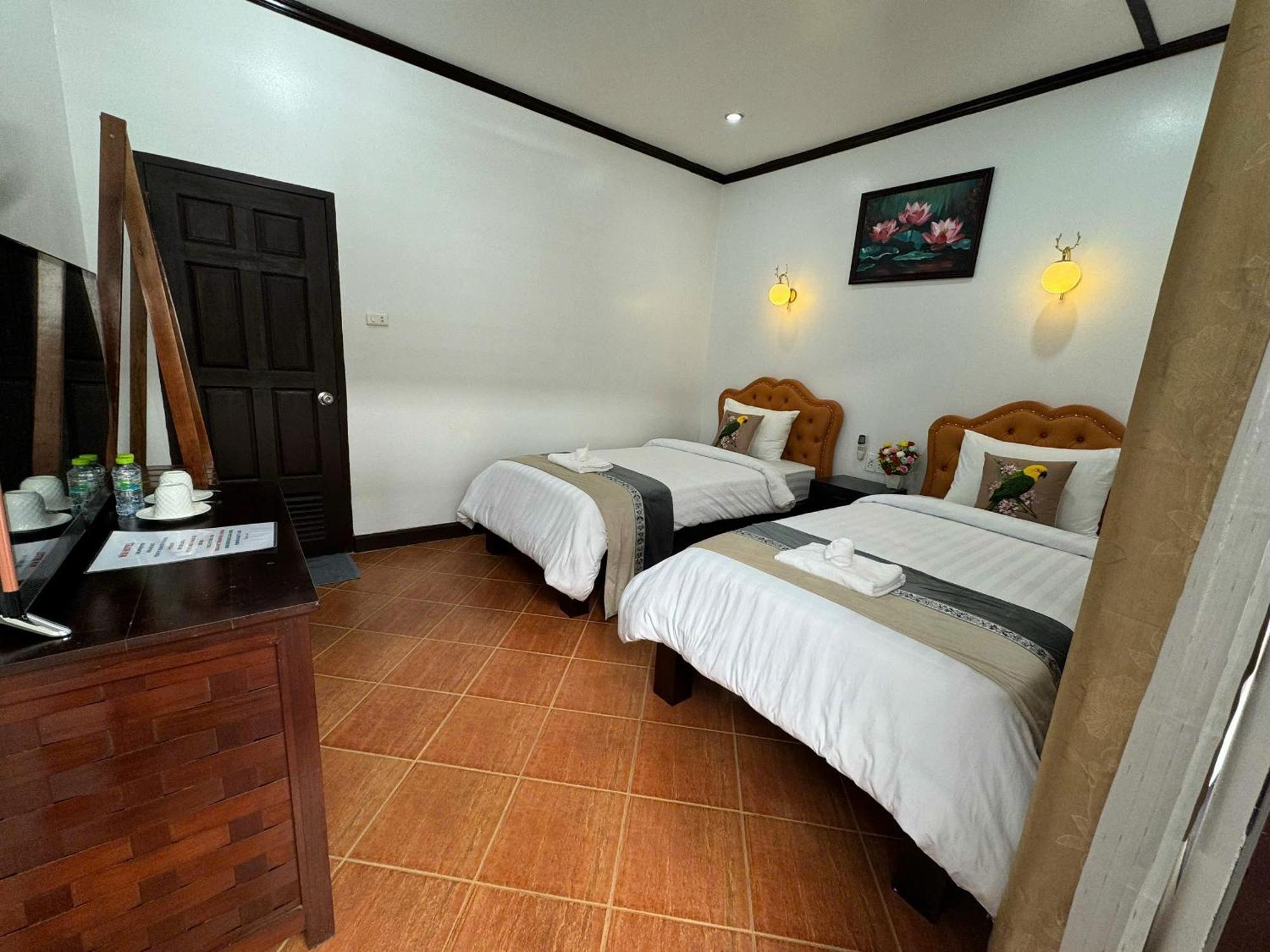 Win Hotel Ванг-В'єнг Номер фото